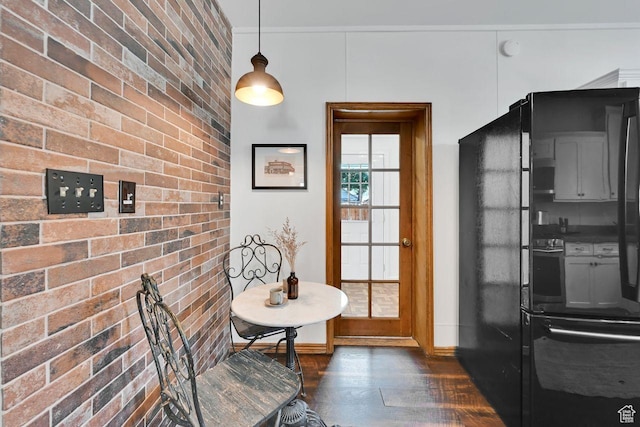 408 E 1700 S, Salt Lake City, UT 84115 - entryway featuring brick wall, dark wood-type flooring, and baseboards