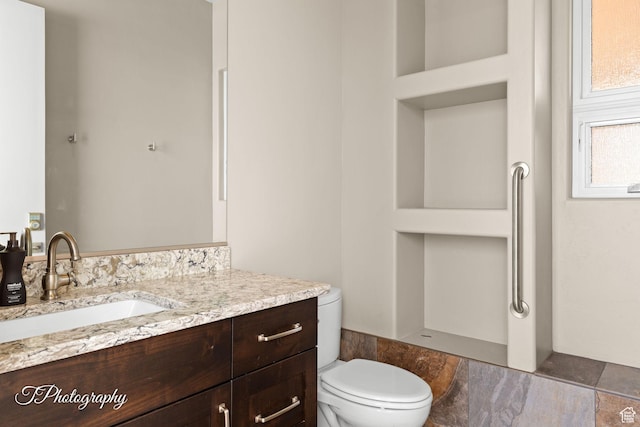 half bath with toilet and vanity