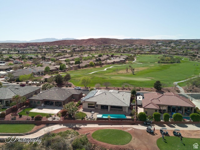 birds eye view of property featuring a residential view, golf course view, and a mountain view