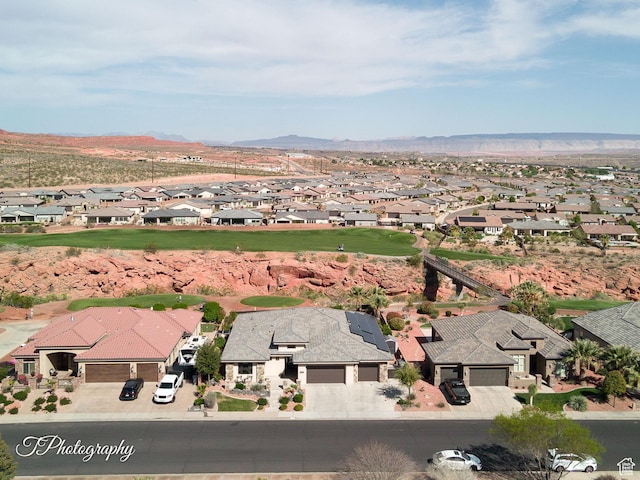 birds eye view of property featuring a residential view and a mountain view