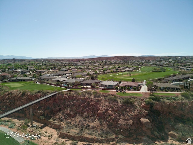 bird's eye view featuring a residential view, a mountain view, and golf course view