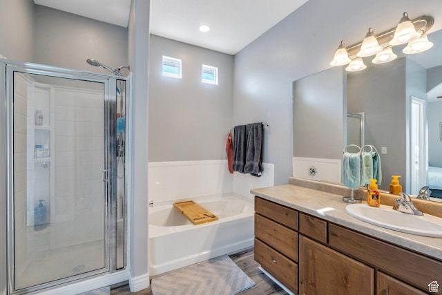 1113 W 160 N, Pleasant Grove, UT 84062 - bathroom featuring a shower stall, a garden tub, vanity, and wood finished floors