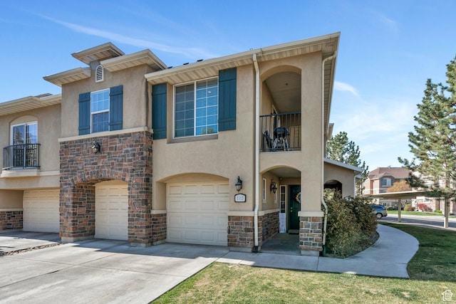 1113 W 160 N, Pleasant Grove, UT 84062 - view of front of house featuring a garage, driveway, stucco siding, and stone siding