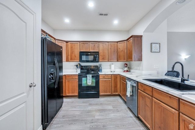 1113 W 160 N, Pleasant Grove, UT 84062 - kitchen featuring a sink, visible vents, black appliances, and brown cabinets