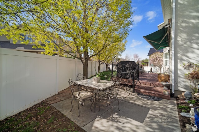 1778 E Indian Wells Ln, Draper, UT 84020 - view of patio featuring a wooden deck, a fenced backyard, and outdoor dining area