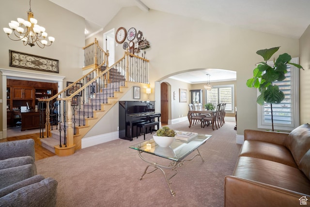 1778 E Indian Wells Ln, Draper, UT 84020 - carpeted living room featuring baseboards, an inviting chandelier, stairway, high vaulted ceiling, and arched walkways