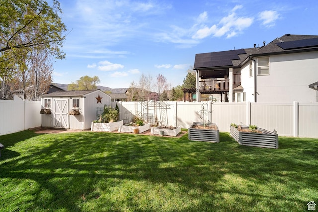 1778 E Indian Wells Ln, Draper, UT 84020 - view of yard featuring a shed, a garden, a fenced backyard, and an outdoor structure