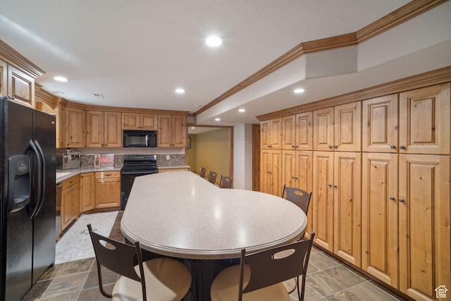 1778 E Indian Wells Ln, Draper, UT 84020 - kitchen featuring tasteful backsplash, light countertops, crown molding, black appliances, and recessed lighting