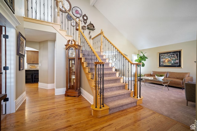 1778 E Indian Wells Ln, Draper, UT 84020 - stairs featuring high vaulted ceiling, baseboards, and wood finished floors