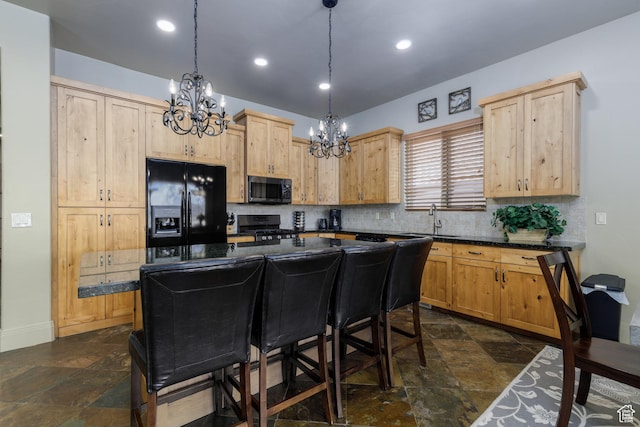 kitchen with light brown cabinetry, stainless steel gas range, a notable chandelier, and black fridge with ice dispenser
