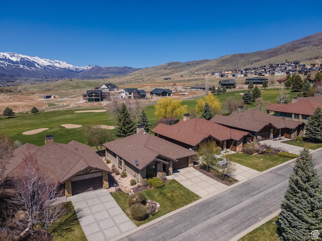birds eye view of property featuring a residential view and a mountain view