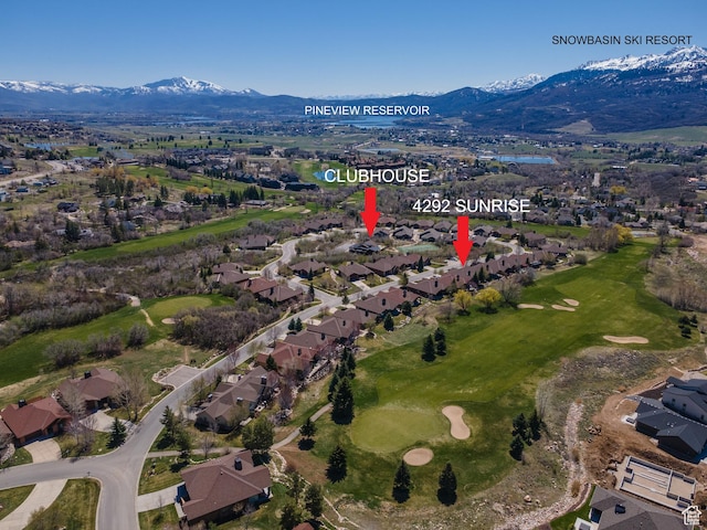 bird's eye view featuring a residential view, a mountain view, and golf course view