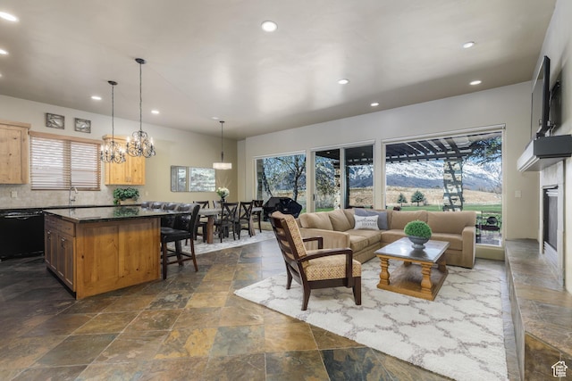 living room featuring a wealth of natural light and recessed lighting