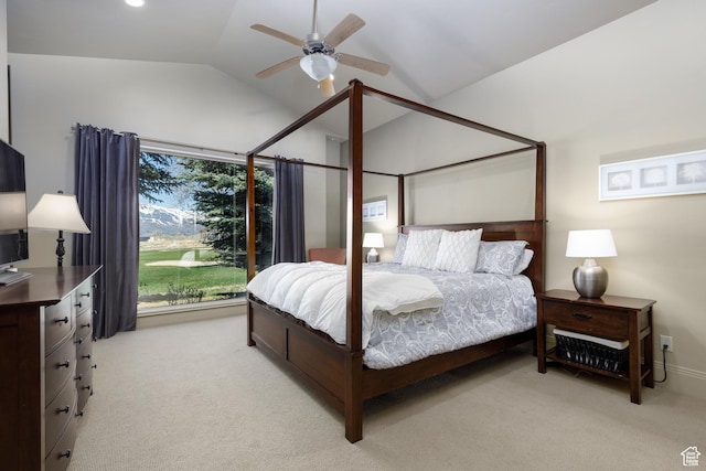 bedroom with light carpet, ceiling fan, and lofted ceiling
