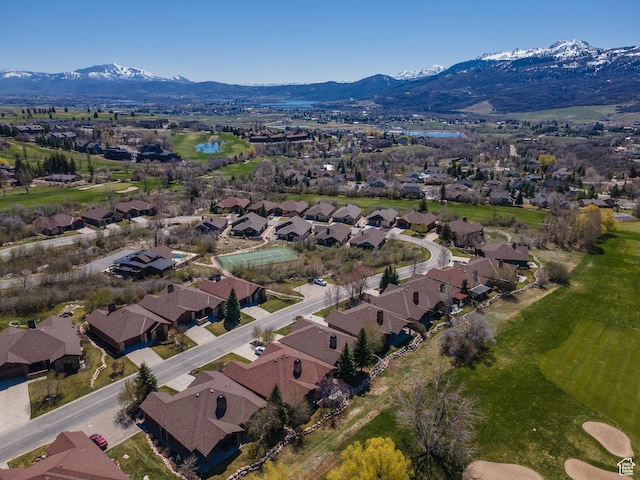 aerial view featuring a mountain view and a residential view