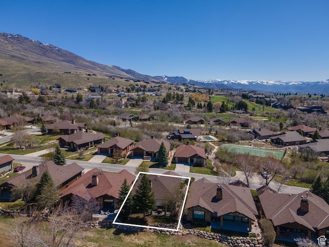 bird's eye view with a residential view and a mountain view