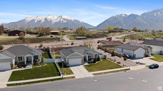 bird's eye view featuring a mountain view and a residential view