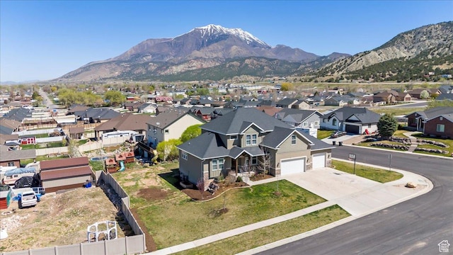 bird's eye view featuring a mountain view and a residential view