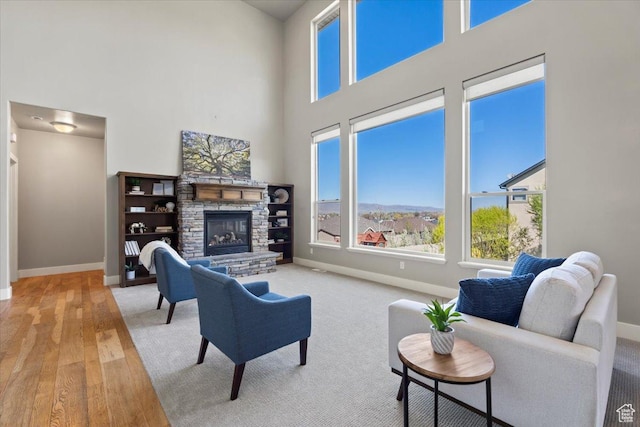 living room featuring baseboards and a wealth of natural light