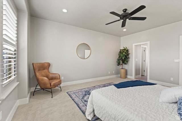 carpeted bedroom featuring ceiling fan, baseboards, and recessed lighting