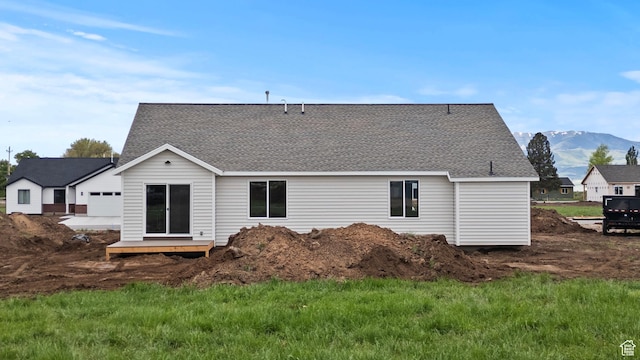 232 N 300 W, Preston, ID 83263 - back of house with roof with shingles and a mountain view