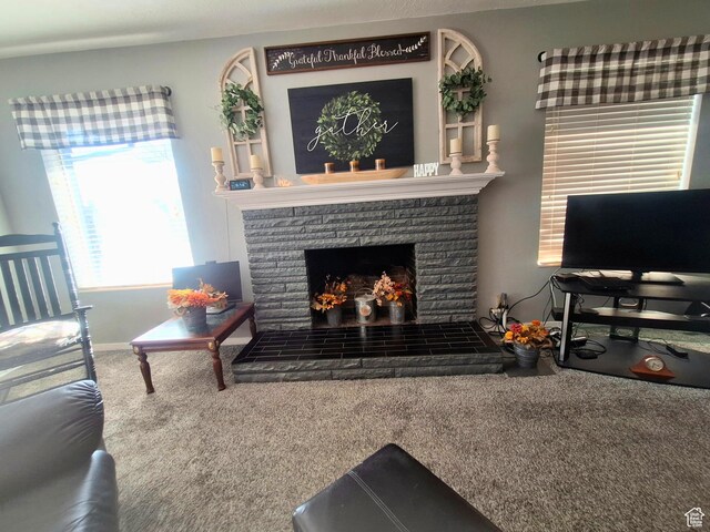 3150 N Iowa Ave E, Ogden, UT 84403 - living room with carpet and a stone fireplace