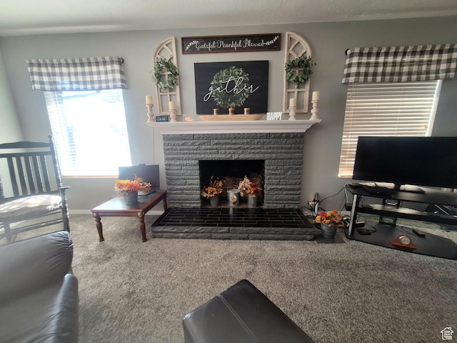 3150 N Iowa Ave W, Ogden, UT 84403 - carpeted living area with a stone fireplace and baseboards