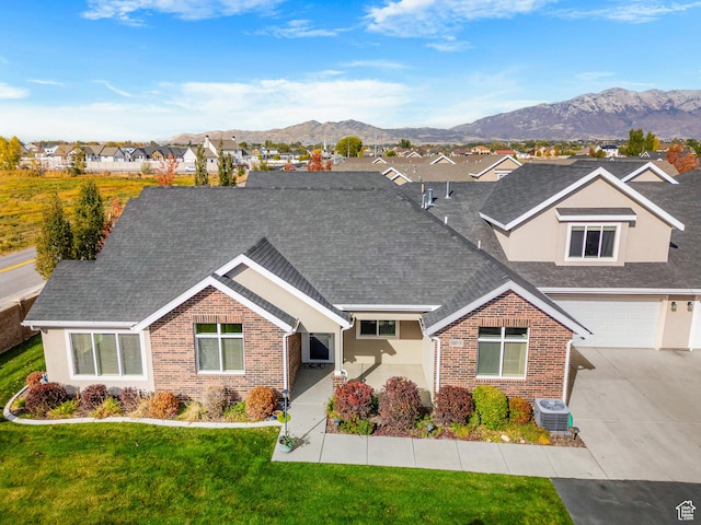 1262 S 50 E Unit 3, Lehi, UT 84043 - view of front of property with driveway, a residential view, a front lawn, and brick siding