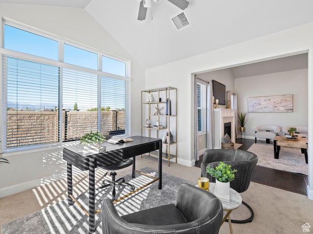 1262 S 50 E Unit 3, Lehi, UT 84043 - carpeted home office featuring baseboards, vaulted ceiling, a ceiling fan, a fireplace with flush hearth, and visible vents