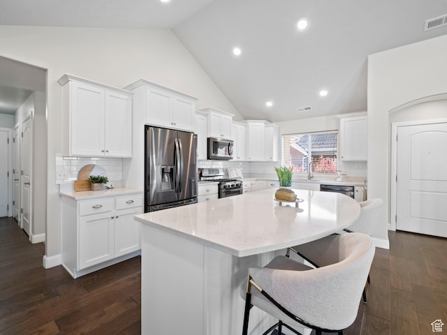 1262 S 50 E Unit 3, Lehi, UT 84043 - kitchen featuring white cabinetry, appliances with stainless steel finishes, lofted ceiling, and visible vents