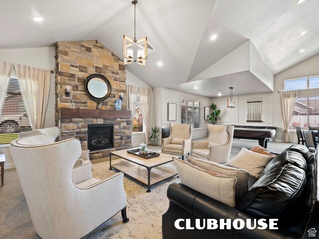 1262 S 50 E Unit 3, Lehi, UT 84043 - living room featuring plenty of natural light, a chandelier, a fireplace, and lofted ceiling