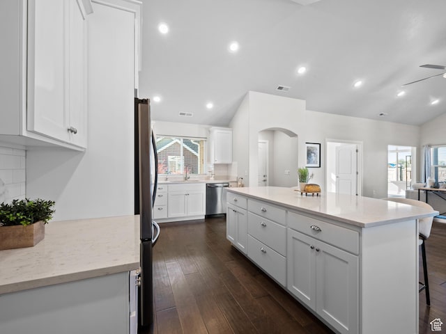 1262 S 50 E Unit 3, Lehi, UT 84043 - kitchen featuring a healthy amount of sunlight, decorative backsplash, vaulted ceiling, and stainless steel appliances
