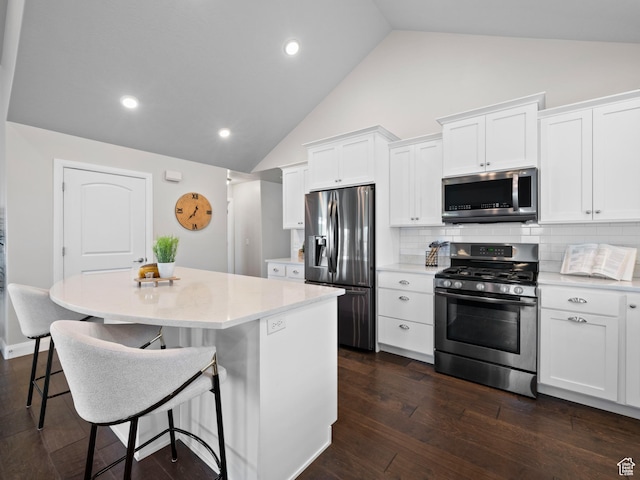 1262 S 50 E Unit 3, Lehi, UT 84043 - kitchen with appliances with stainless steel finishes, light countertops, white cabinets, and a kitchen island