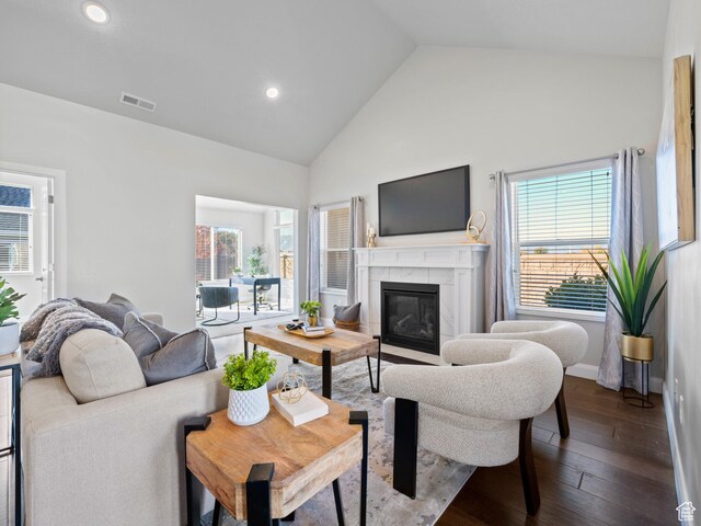 1262 S 50 E Unit 3, Lehi, UT 84043 - living room with visible vents, high vaulted ceiling, plenty of natural light, and dark wood-style floors