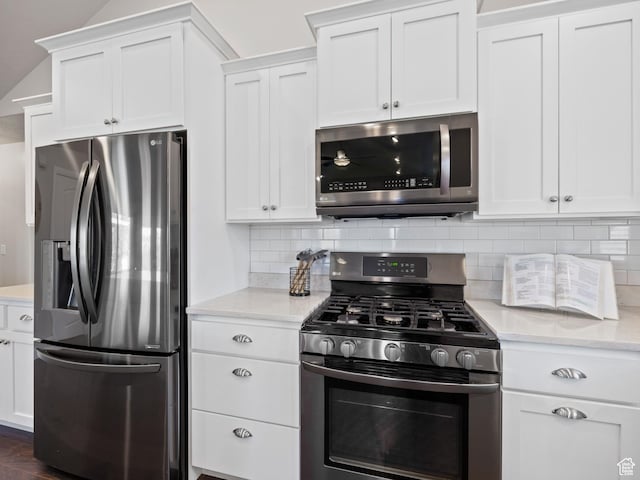 1262 S 50 E Unit 3, Lehi, UT 84043 - kitchen with tasteful backsplash, white cabinetry, and stainless steel appliances
