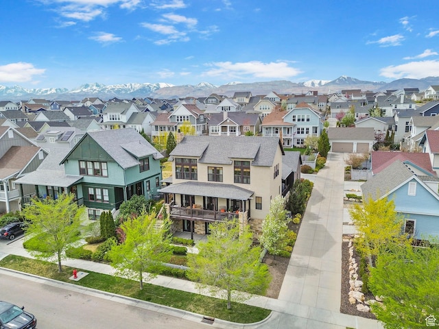 bird's eye view featuring a mountain view and a residential view