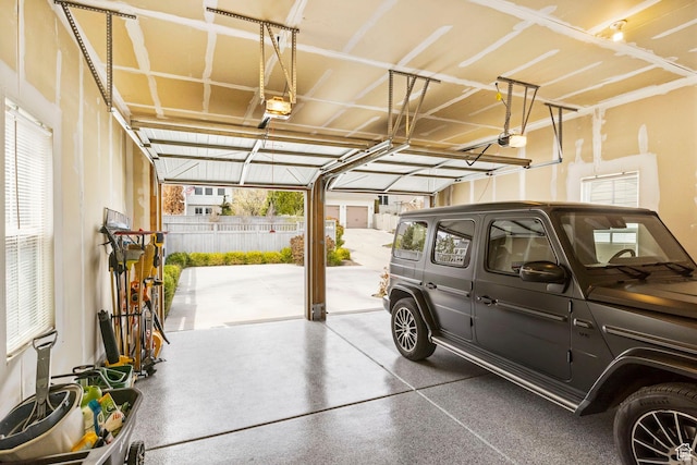 garage featuring a garage door opener