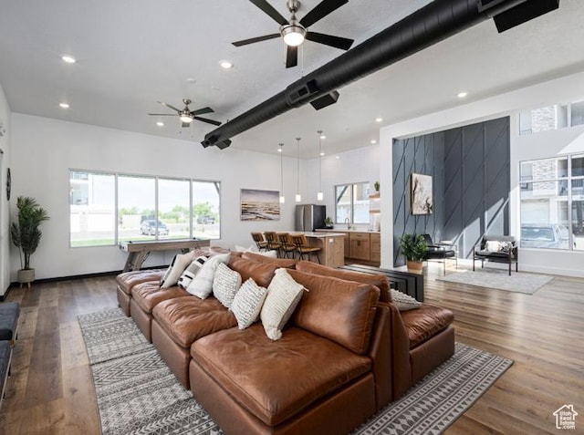 living room featuring a wealth of natural light, recessed lighting, wood finished floors, and ceiling fan