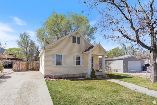 44 E 400 N, Manti, UT 84642 - bungalow-style home featuring a garage, driveway, fence, and a front lawn