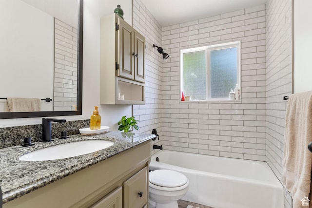 full bath with vanity, shower / tub combination, and toilet