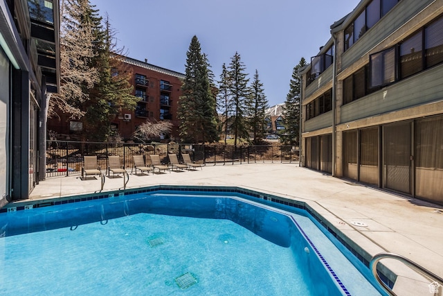 1485 Empire Ave Unit 506, Park City, UT 84060 - community pool with a patio area and fence