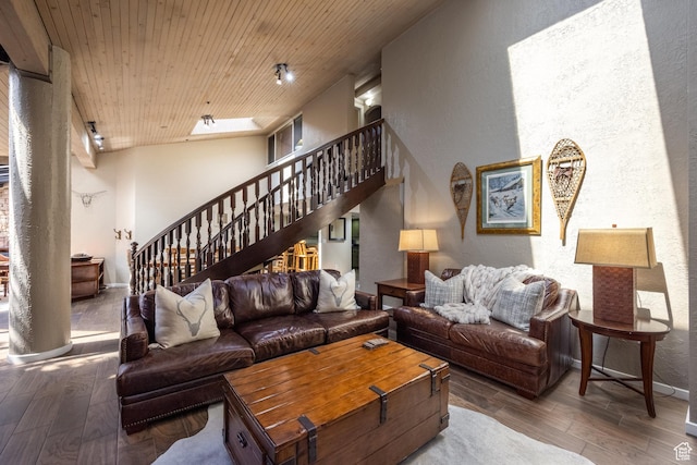 1485 Empire Ave Unit 506, Park City, UT 84060 - living room with baseboards, wooden ceiling, a textured wall, stairway, and wood-type flooring