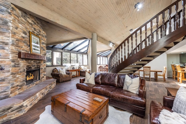 1485 Empire Ave Unit 506, Park City, UT 84060 - living room with stairs, a fireplace, beam ceiling, and wood finished floors