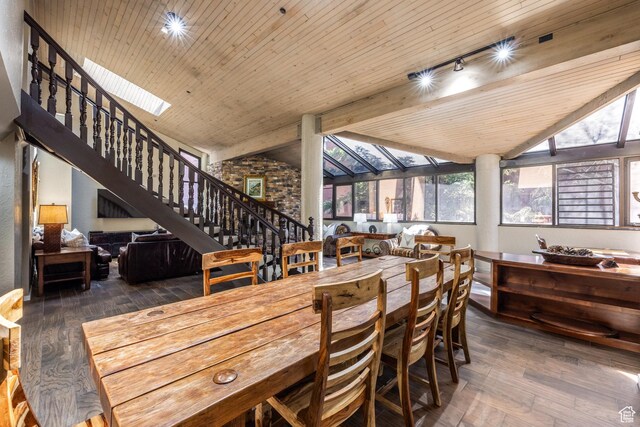 1485 Empire Ave Unit 506, Park City, UT 84060 - dining room with stairway, wood-type flooring, wooden ceiling, and lofted ceiling with beams