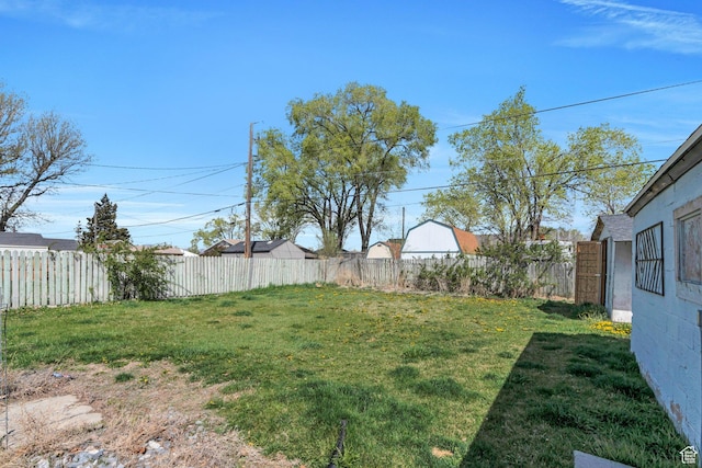 view of yard with a fenced backyard