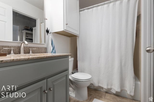 3131 Applewood Dr, Bountiful, UT 84010 - full bath featuring toilet, tile patterned floors, shower / tub combo with curtain, and vanity