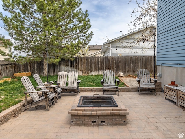 4866 W Diamondleaf Way S, West Jordan, UT 84081 - view of patio with fence and an outdoor fire pit