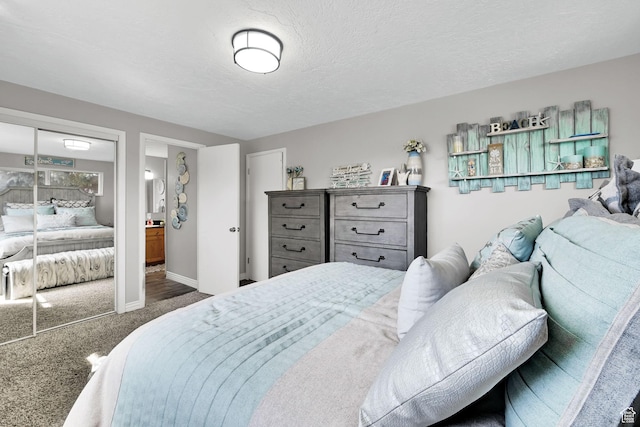 carpeted bedroom with baseboards