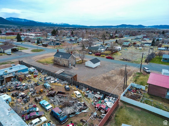 drone / aerial view featuring a mountain view