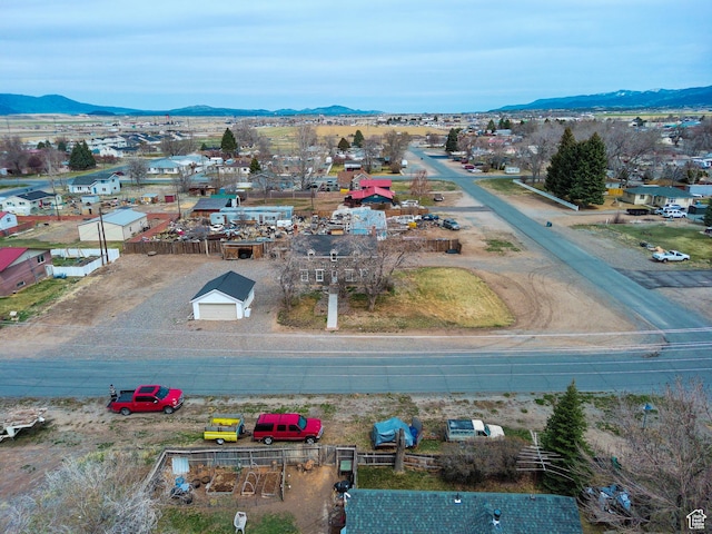birds eye view of property featuring a mountain view